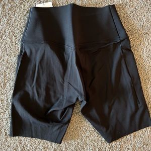 Nike Universa Women's Medium-Support High-Waisted 8" Biker Shorts with Pockets